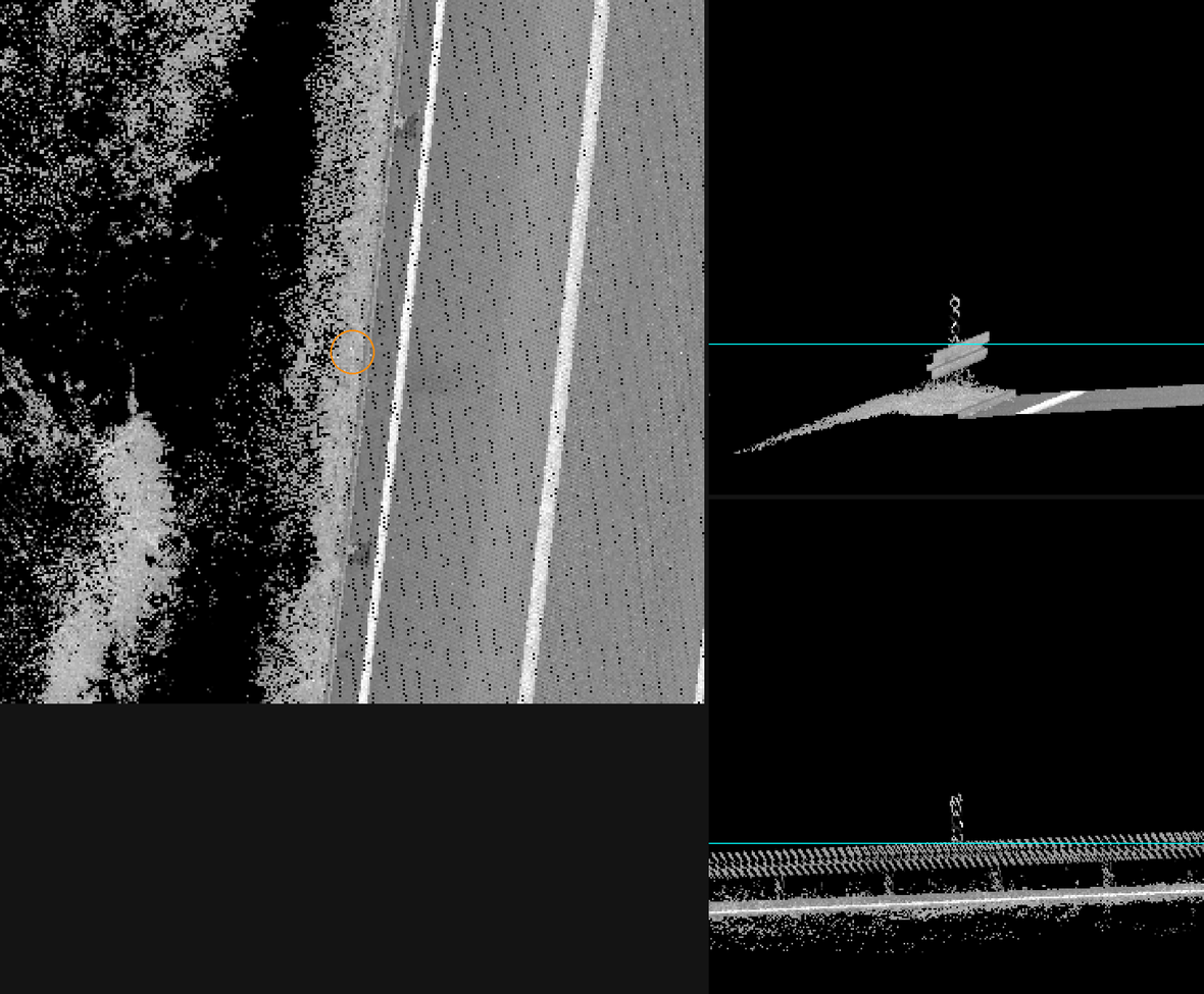 Short reflector post standing on top of a safety barrier